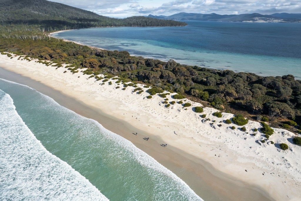 McRaes Isthmus – a narrow neck of sand with sweeping beaches on either side.
